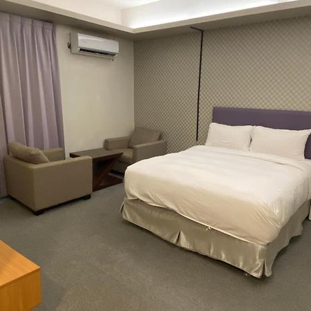 Aiyue Hotel Huwei Luaran gambar