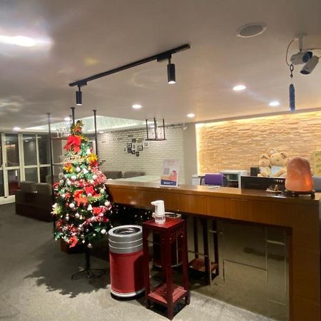 Aiyue Hotel Huwei Luaran gambar