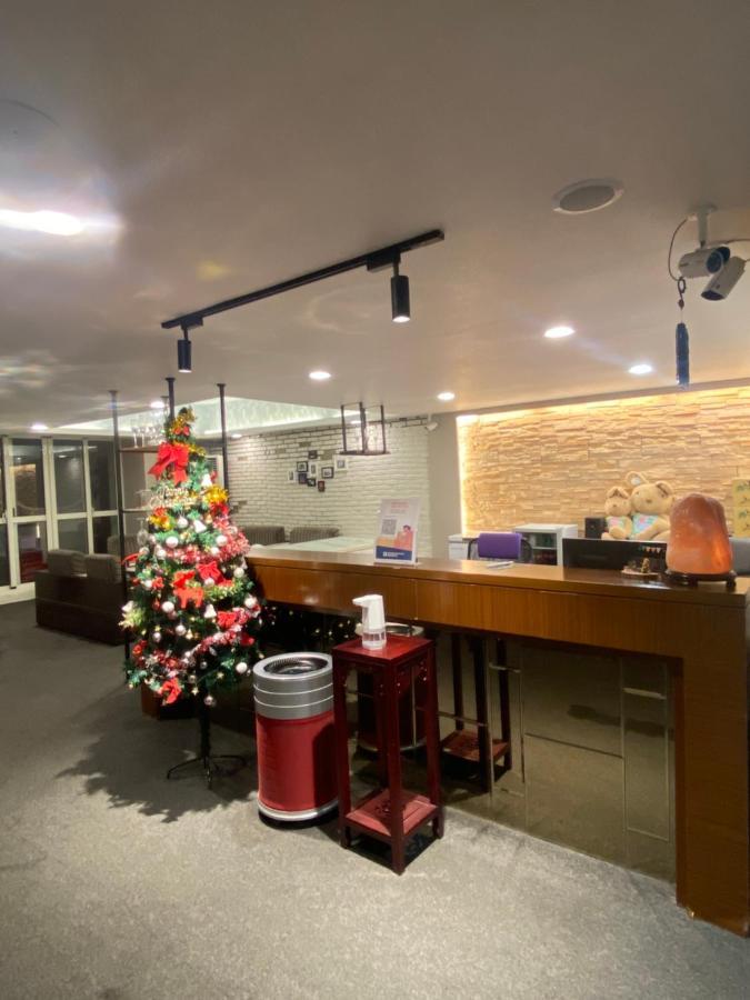 Aiyue Hotel Huwei Luaran gambar