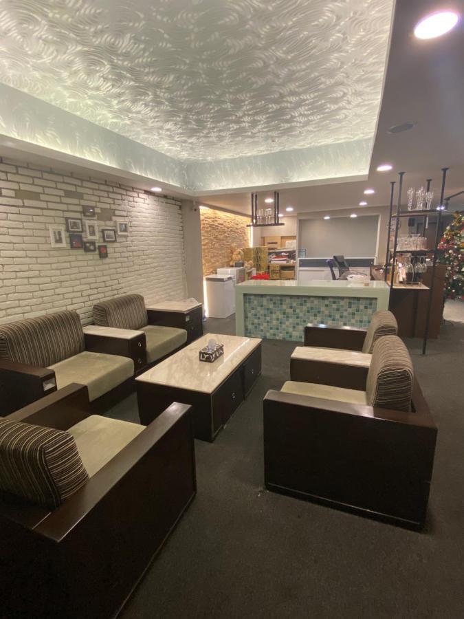 Aiyue Hotel Huwei Luaran gambar